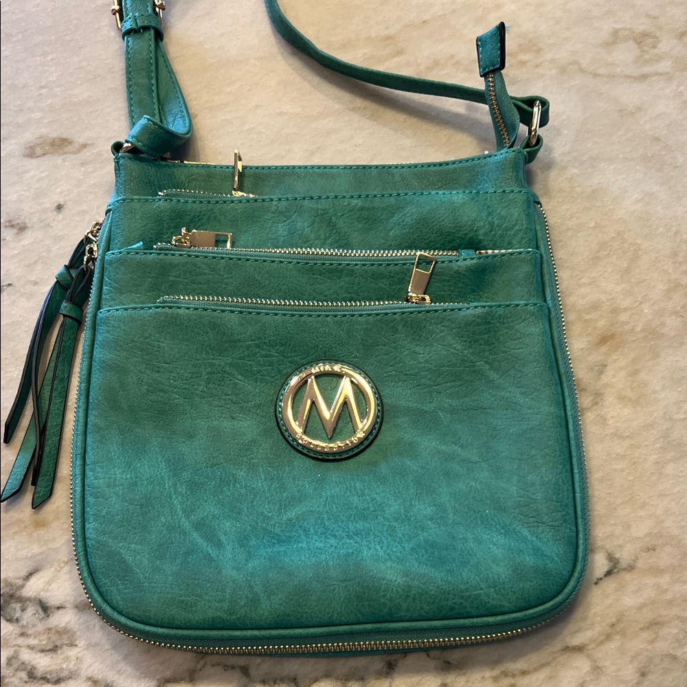 Elegant Teal Crossbody Bag with Gold Accents